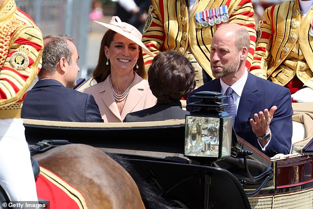 Pictured: The Prince and Princess of Wales during the carriage procession to Windsor Castle today