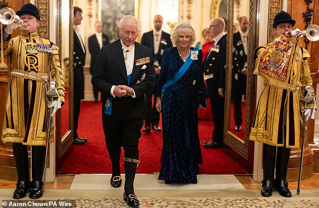 King Charles and Queen Camilla arrive at the Diplomatic Corps reception in November 2024, with Charles in traditional knee breeches and buckled shoes