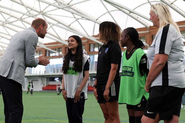 William speaks with young aspiring footballers at St George's Park 