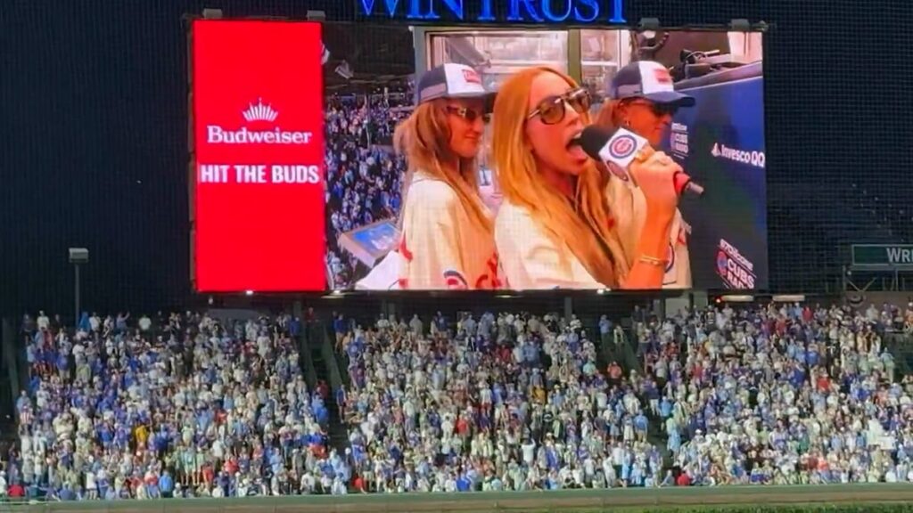 Alex Cooper booed while singing at Cubs game: Watch