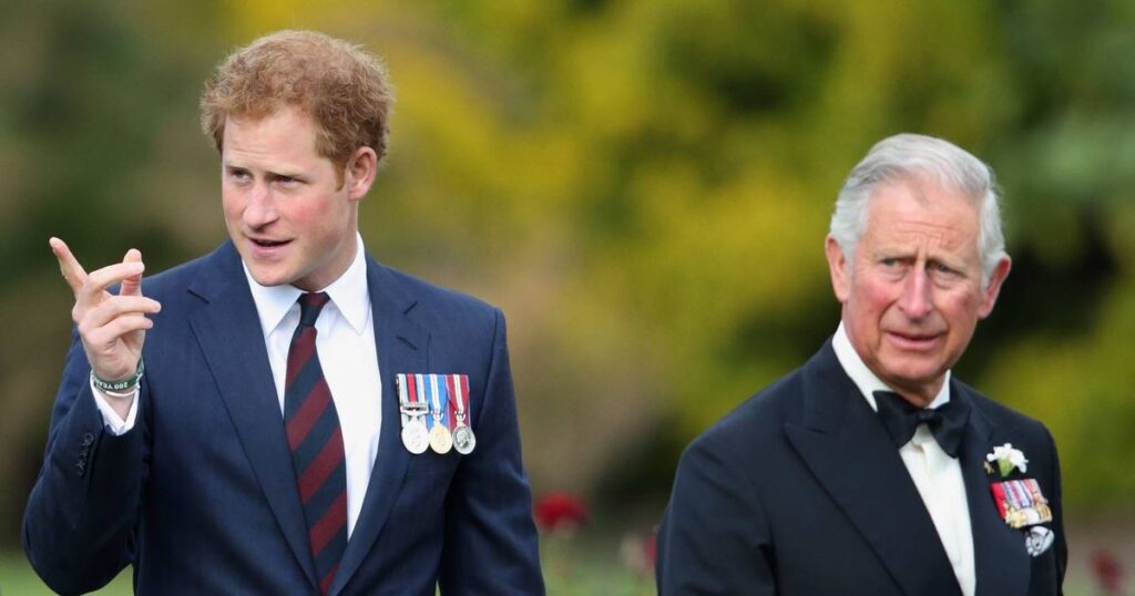 Harry holds hands with wife Meghan