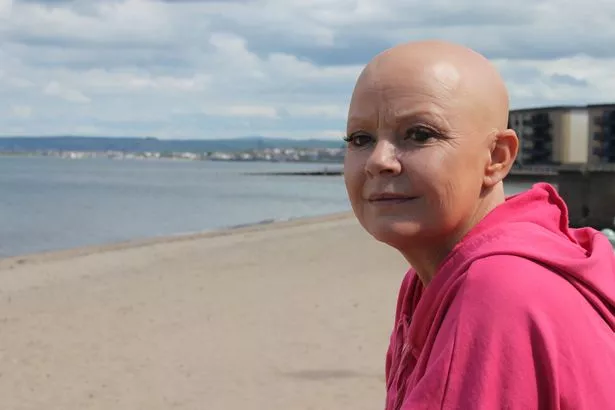 Gail Porter at a beach