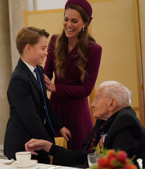 George laughs with mum Kate 