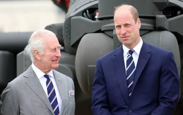 STOCKBRIDGE, HAMPSHIRE - MAY 13: King Charles III and Prince William, Prince of Wales share a joke during the official handover in which King Charles III passes the role of Colonel-in-Chief of the Army air corps to Prince William, Prince of Wales at the Army Aviation Centre on May 13, 2024 in Stockbridge, Hampshire. (Photo by Chris Jackson/Getty Images)