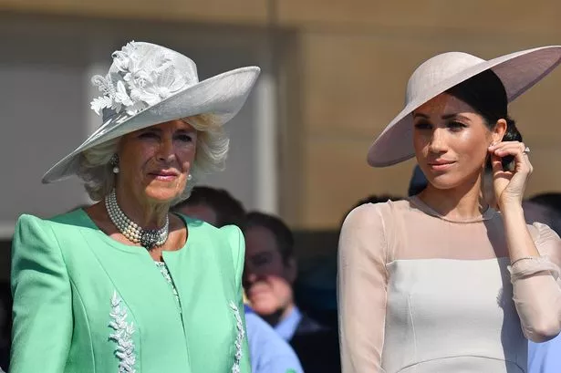 Queen Camilla with Meghan in 2018