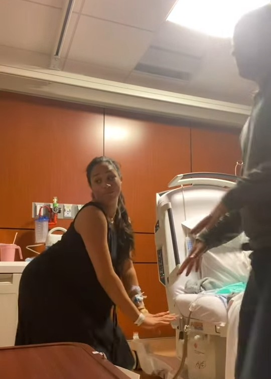 Meghan Markle and Prince Harry in a hospital room after the birth of their daughter.