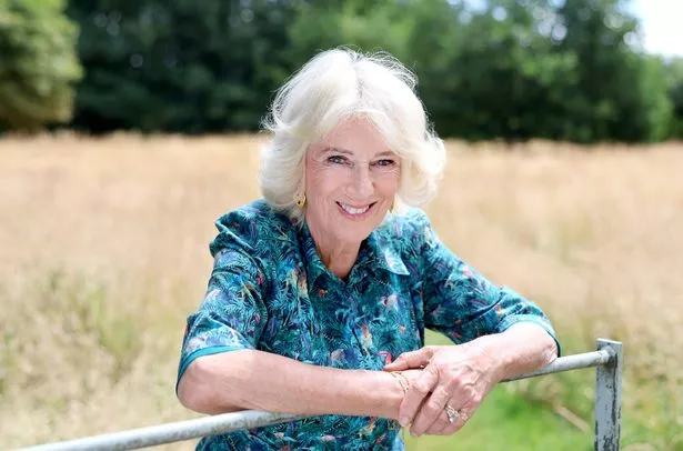 Queen Camilla posing for a portrait to mark her birthday in the garden of her home Ray Mill House in the village of Lacock