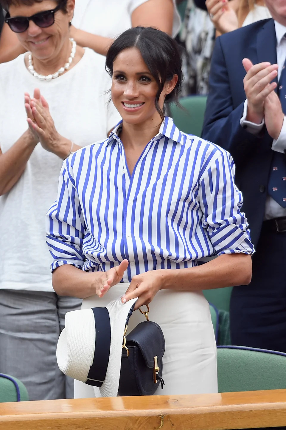 Meghan Markle and Kate Middleton twin in matching Ralph Lauren Capri shirts both featuring stripes