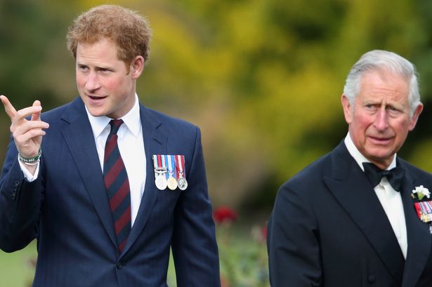 Prince Harry with his father King Charles 