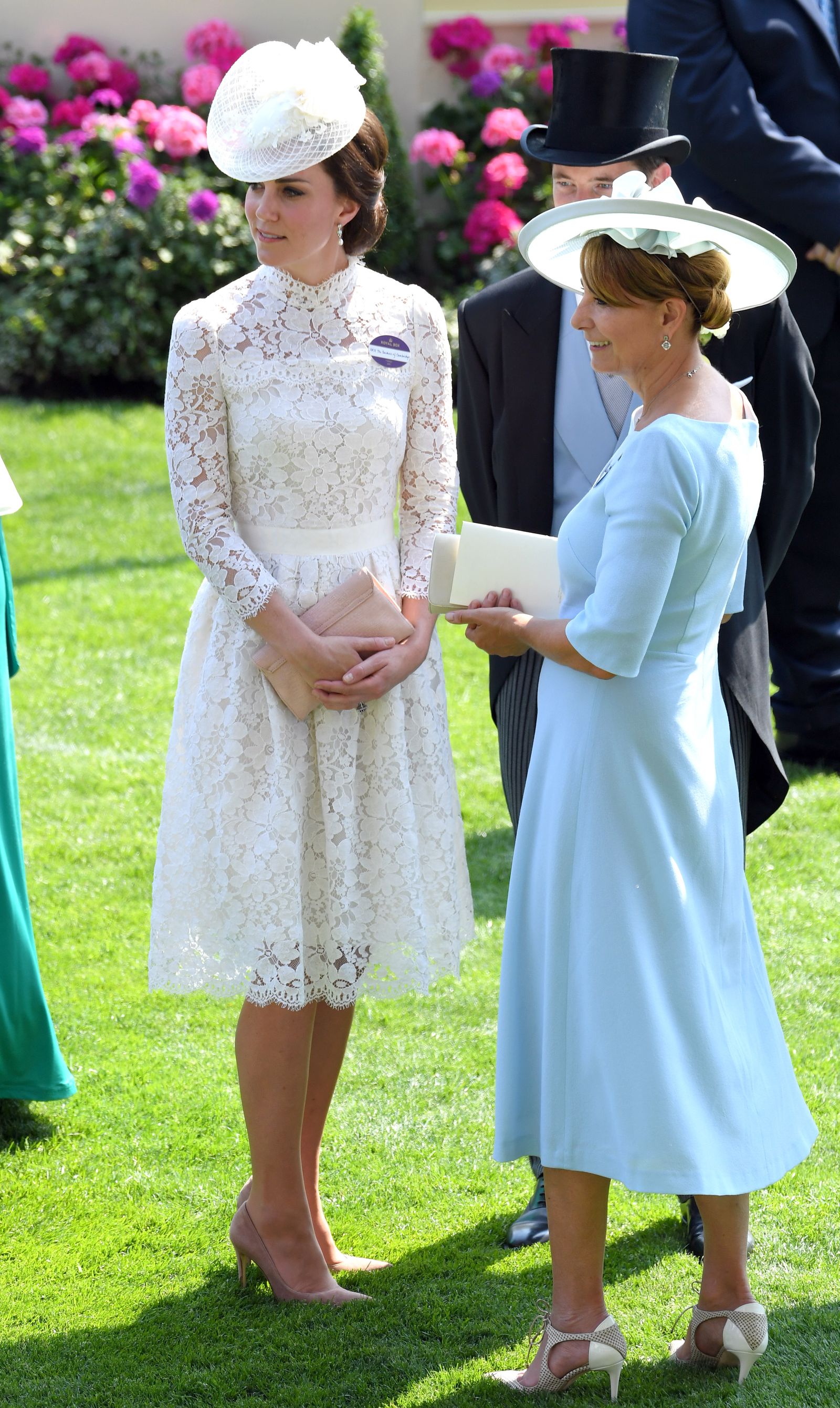 Image may contain Carole Middleton Person Clothing Footwear High Heel Shoe Hat Child Adult Wedding and Accessories