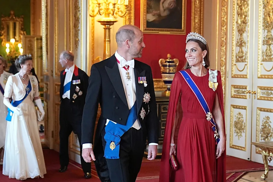 Aaron Chown/ Pool via Getty Images - PHOTO: Prince William, Prince of Wales and Catherine, Princess of Wales arrive for the State Banquet for President of France Emmanuel Macron and his wife Brigitte Macron, at Windsor Castle, July 8, 2025 in Windsor, England.
