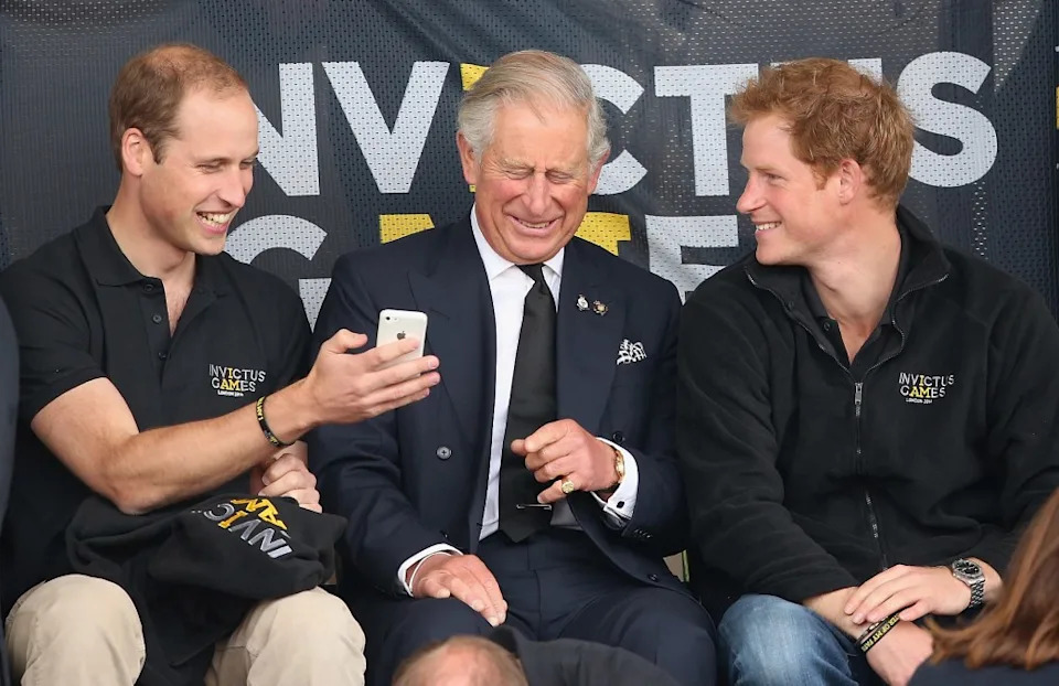 Prince William, King Charles and Prince Harry attend the 2014 Invictus Games in London. Getty Images