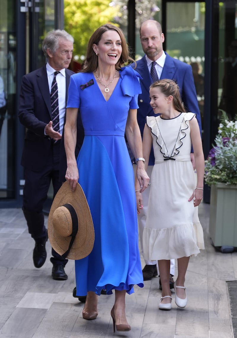 The Prince and Princess of Wales arrive with Princess Charlotte on day fourteen of the 2025 Wimbledon Championships at the All England Lawn Tennis and Croquet Club