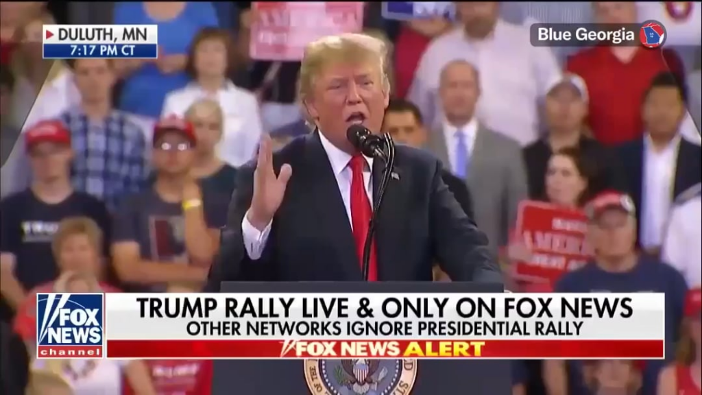 Trump freaks out when photo of him and Epstein appears at MAGA rally in 2018
