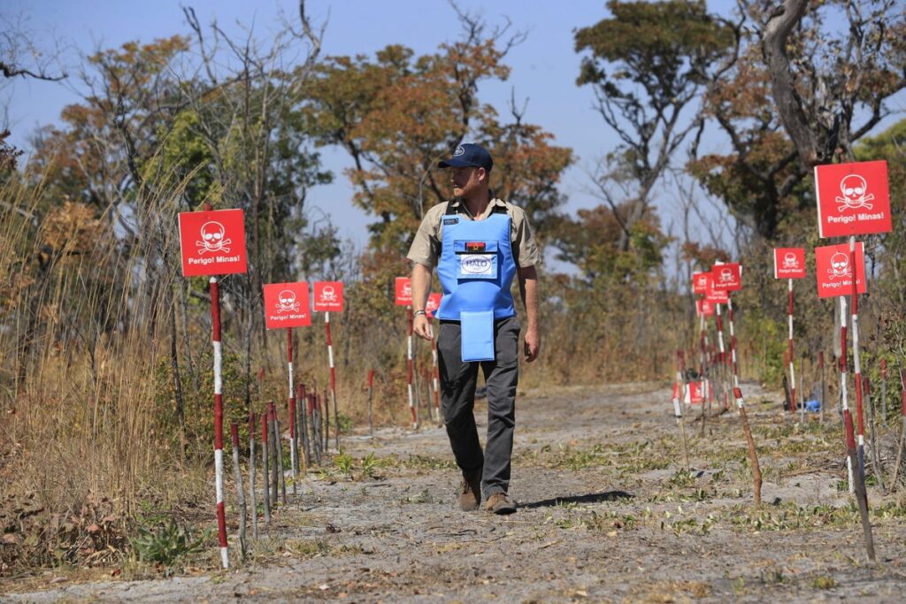 Prince Harry retraces Diana’s footsteps by walking through a land mine field in Angola for charity Prince Harry retraces Diana's footsteps by walking through a land mine field in Angola for charity