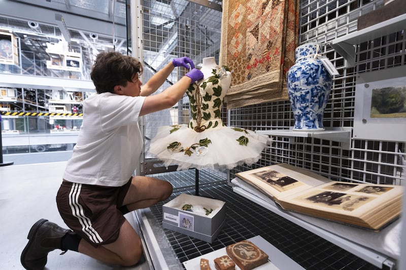 V&A East Storehouse staff preparing the new mini display ‘Makers and Creators’, curated by the Princess of Wales (David Parry/V&A East Storehouse)