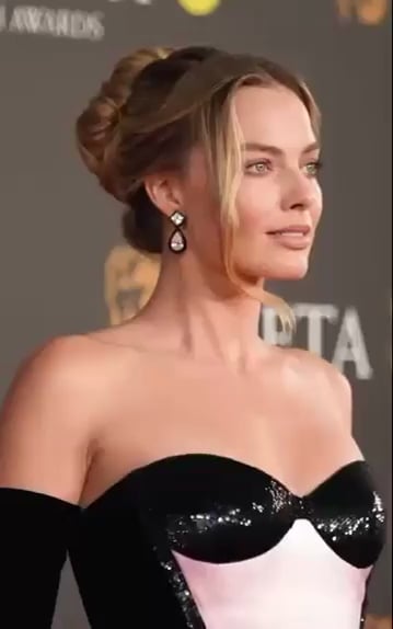 Margot Robbie attends the EE BAFTA Film Awards 2024 at The Royal Festival Hall in London - February 2024