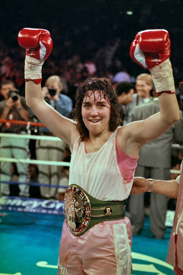 Christy Martin celebrates after winning a WBC Championship Boxing Lightweight fight.