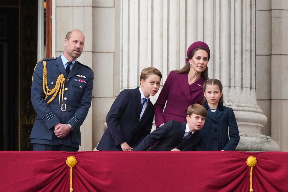 Prince William, Kate, Princess of Wales, and their three children on the Buckingham Palace balcony.