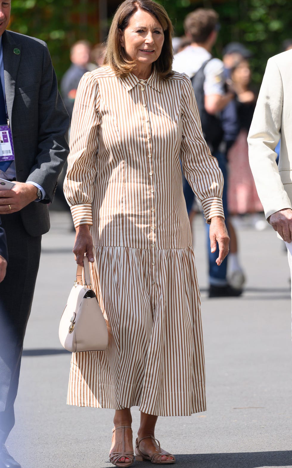carole middleton wears brown and white striped midi dress at Wimbledon carole middleton walking round wimbledon grounds in brown and white striped shirt dress
