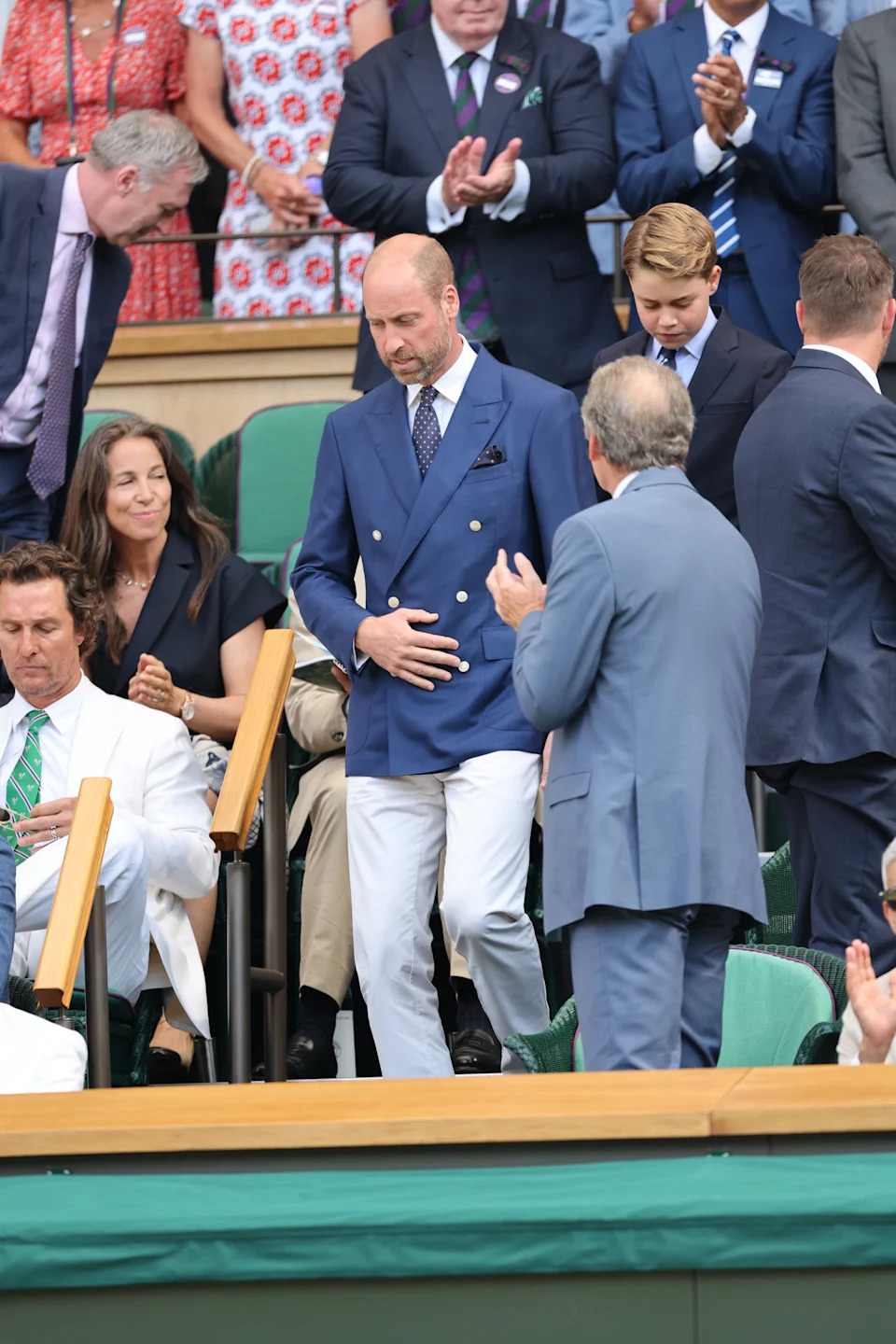 Both George and William looked dapper in navy blue suits. ZUMAPRESS.com