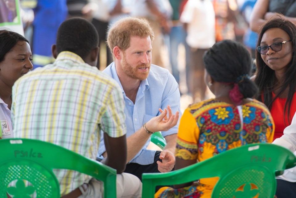 Prince Harry speaking with young people in Malawi.