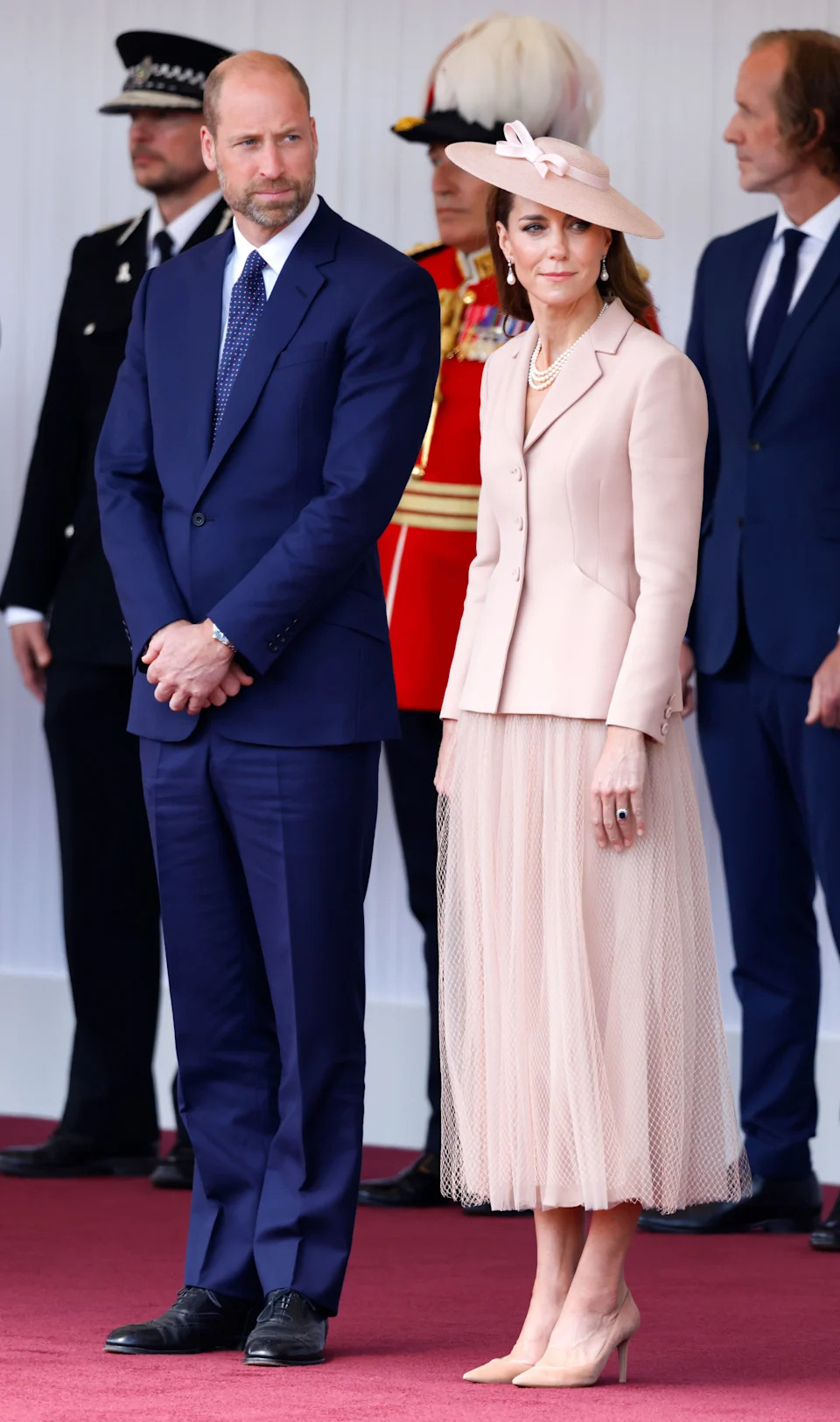 WINDSOR, UNITED KINGDOM - JULY 08: (EMBARGOED FOR PUBLICATION IN UK NEWSPAPERS UNTIL 24 HOURS AFTER CREATE DATE AND TIME) Prince William, Prince of Wales and Catherine, Princess of Wales attend the formal welcome, at the Royal Dais, Datchet Road, for French President Emmanuel Macron and Brigitte Macron on day one of their State Visit to the United Kingdom on July 8, 2025 in Windsor, England. President Emmanuel Macron and Mrs Brigitte Macron visit the UK in the first visit State Visit made by France in 17 years. They are staying at Windsor Castle, hosted by King Charles III and Queen Camilla, and a banquet will be held there in their honour. The Macrons will visit Imperial College, and the President will address Parliament during his stay. (Photo by Max Mumby/Indigo/Getty Images)