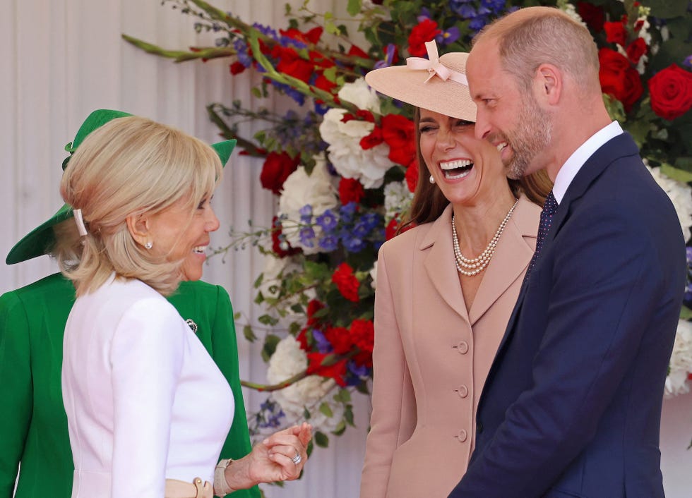 britain's prince william, prince of wales (r) and britain's catherine, princess of wales (2r) react as they greet wife of france's president brigitte macron, during a ceremonial welcome at windsor castle, in windsor west of london, on july 8, 2025, on the first day of a three day state visit to britain. french president emmanuel macron began a three day state visit to britain on tuesday, which will see him address parliament and try to rekindle a purportedly warm relationship with king charles iii. (photo by chris jackson / pool / afp) britain's prince william, prince of wales (r) and britain's catherine, princess of wales (2r) react as they greet wife of france's president brigitte macron, during a ceremonial welcome at windsor castle, in windsor west of london, on july 8, 2025, on the first day of a three day state visit to britain. french president emmanuel macron began a three day state visit to britain on tuesday, which will see him address parliament and try to rekindle a purportedly warm relationship with king charles iii. (photo by chris jackson / pool / afp)