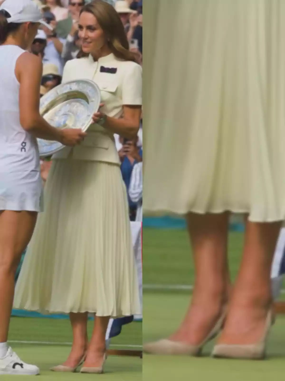 Two women at a sports award ceremony, one of them holding a silver trophy and wearing a light-colored outfit with a pleated skirt and beige heels.