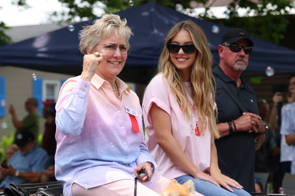 Christy Martin and Sydney Sweeney at a parade.