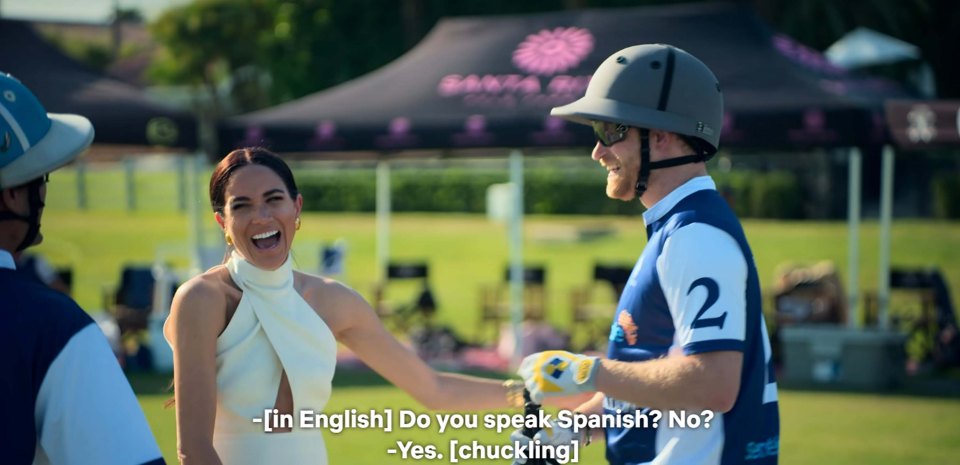 Meghan Markle and Prince Harry laughing at a polo match.