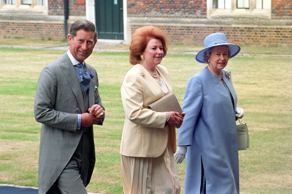 The Queen, Prince Charles, and Lady Elizabeth Anson at a wedding reception.