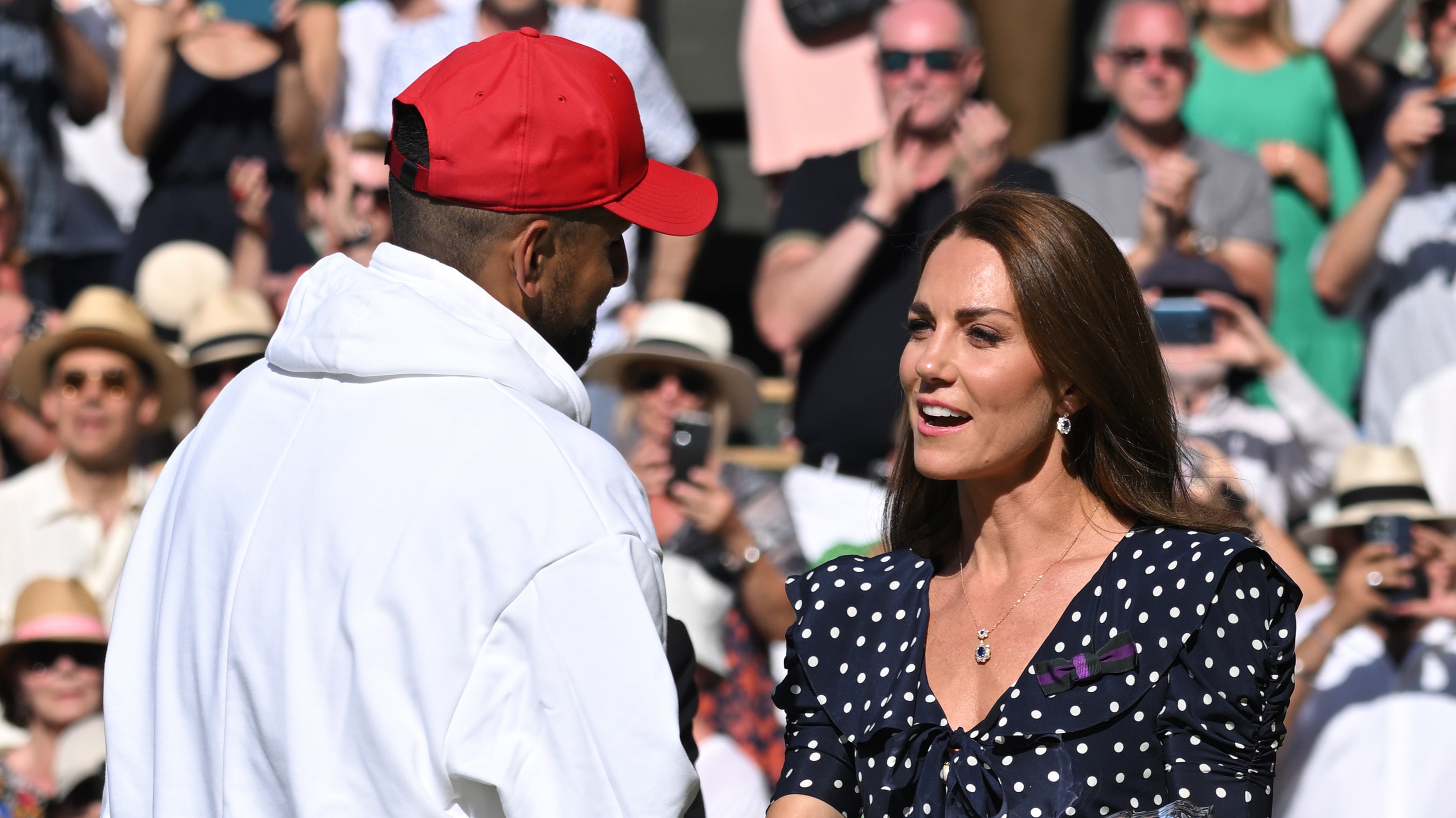 Catherine, Princess of Wales presents the Runners Up Dish to Nick Kyrgios at the Wimbledon Men's Singles Final at All England Lawn Tennis and Croquet Club on July 10, 2022