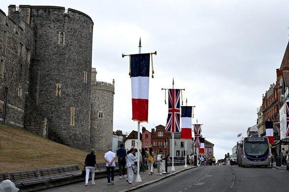 British and French flags are flown outside Windsor Castle British and French flags are flown outside Windsor Castle