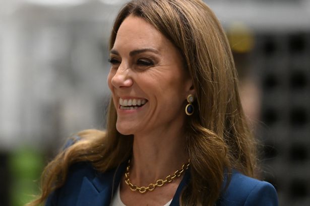LONDON, ENGLAND - JUNE 10: Catherine, Princess of Wales reacts during a visit to the V&A East Storehouse on June 10, 2025 in London, England. Opened on 31 May, V&A East Storehouse reinvents the idea of a museum store and offers free, unprecedented public access to the V&A collections and archives. (Photo by Eddie Mulholland - WPA Pool/Getty Images)