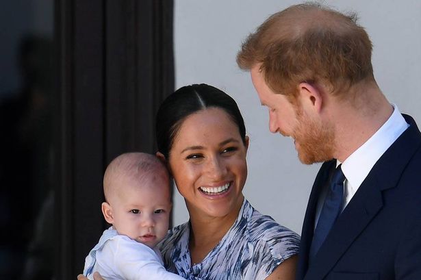 Meghan Markle and Prince Harry with Prince Archie as a baby