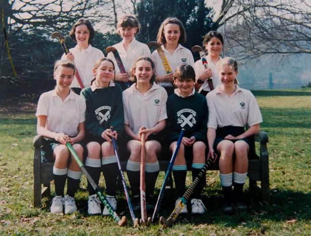 Kate (centre) with her school hockey team