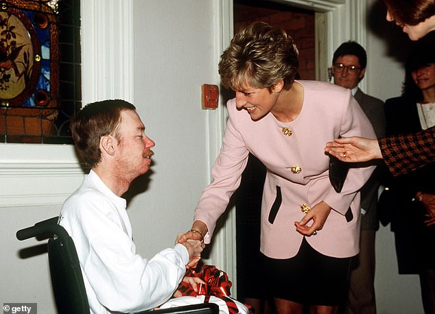 William's mother, Princess Diana, shakes hands with a patient at the UK's first dedicated HIV/AIDS unit at London Middlesex Hospital in April 1987