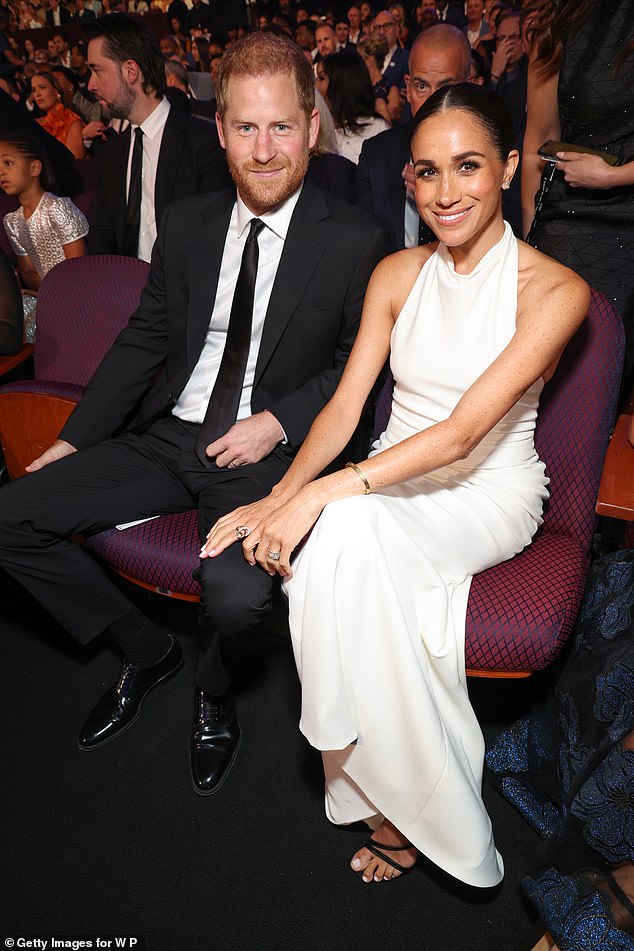 Harry and Meghan pictured last year. Jackson says their drop in popularity has scared off people playing their lookalikes