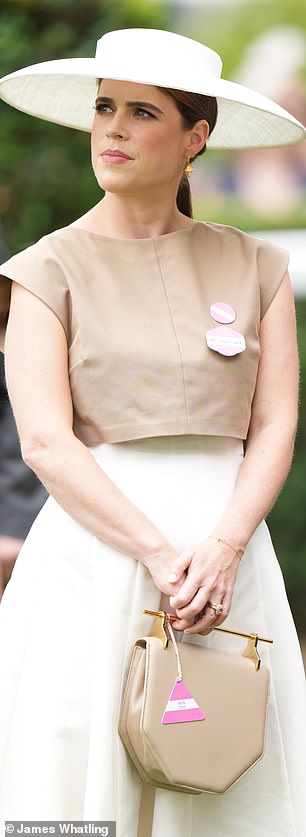 On day four of Royal Ascot, Eugenie wore a coffee and cream coloured two-piece skirt and top and a wide-brimmed white hat
