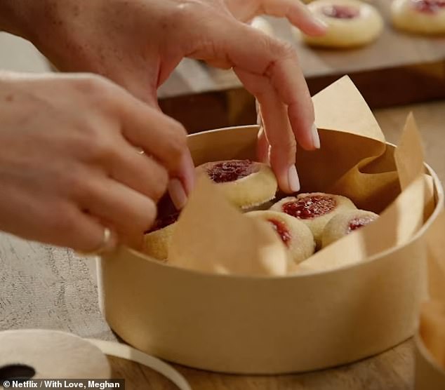 One of the 'easy ways to show up lovingly' suggested by the mother-of-two in the trailer - is making biscuits dolloped with jam