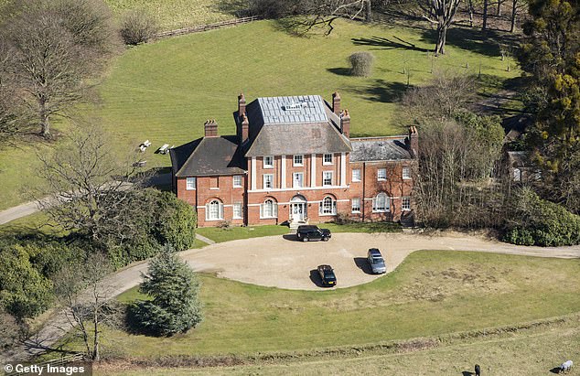 The couple, along with their children Prince George, Princess Charlotte and Prince Louis , reportedly plan to relocate to the eight-bedroom Forest Lodge property in Windsor Great Park (pictured)