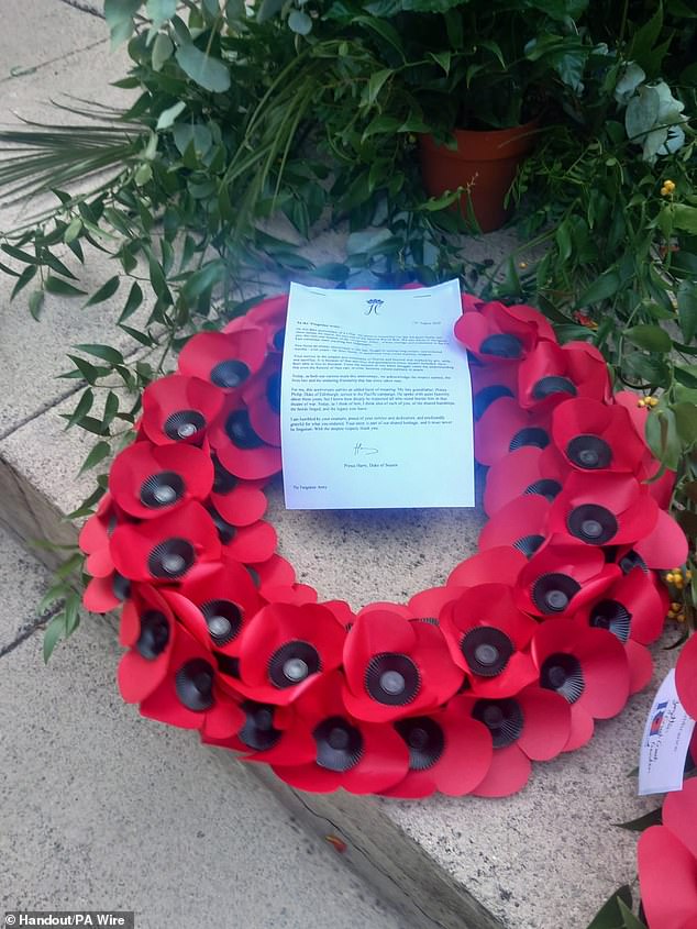 The personal letter and a wreath of red poppies left at the Burma Star Memorial last Friday