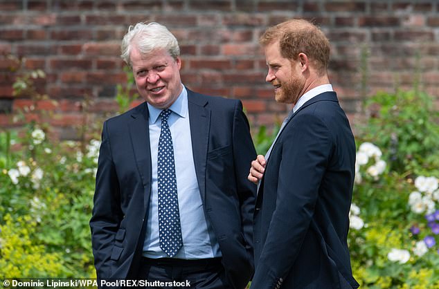 Prince Harry with his uncle Earl Spencer, at the unveiling of a statue of his mother Diana, Princess of Wales