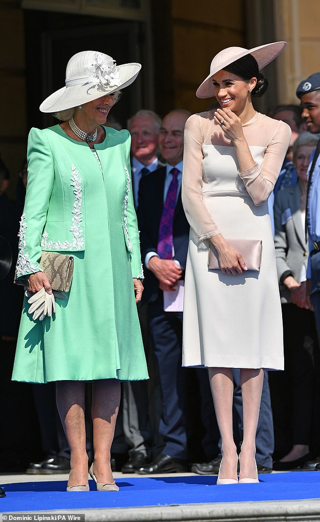 On the same day that season two of With Love, Meghan released, the Duchess's interview with Bloomberg's Emily Chang went live on YouTube. At one point during their free-wheeling chat, Meghan complained she 'had to wear nude pantyhose all the time' during her time as a working royal