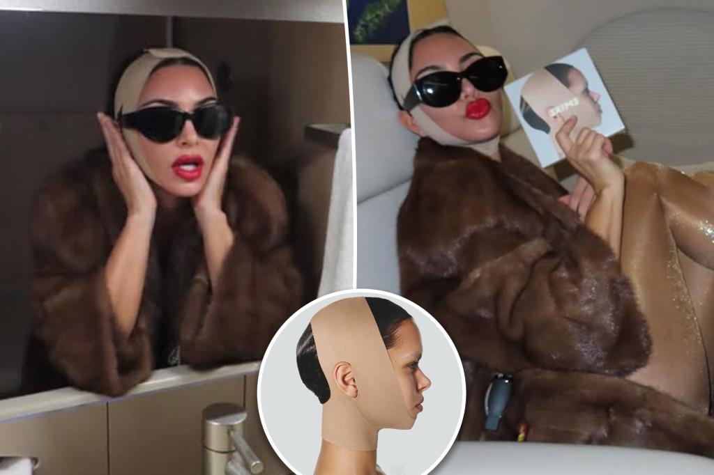 Kim Kardashian models her new Skims face wrap with tights and fur Kim Kardashian models her new Skims face wrap with tights and fur