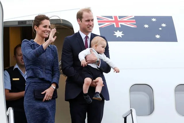 Hagen Hopkins/Getty Kate Middleton, Prince William and Prince George board a plane at Wellington airport on April 16, 2014