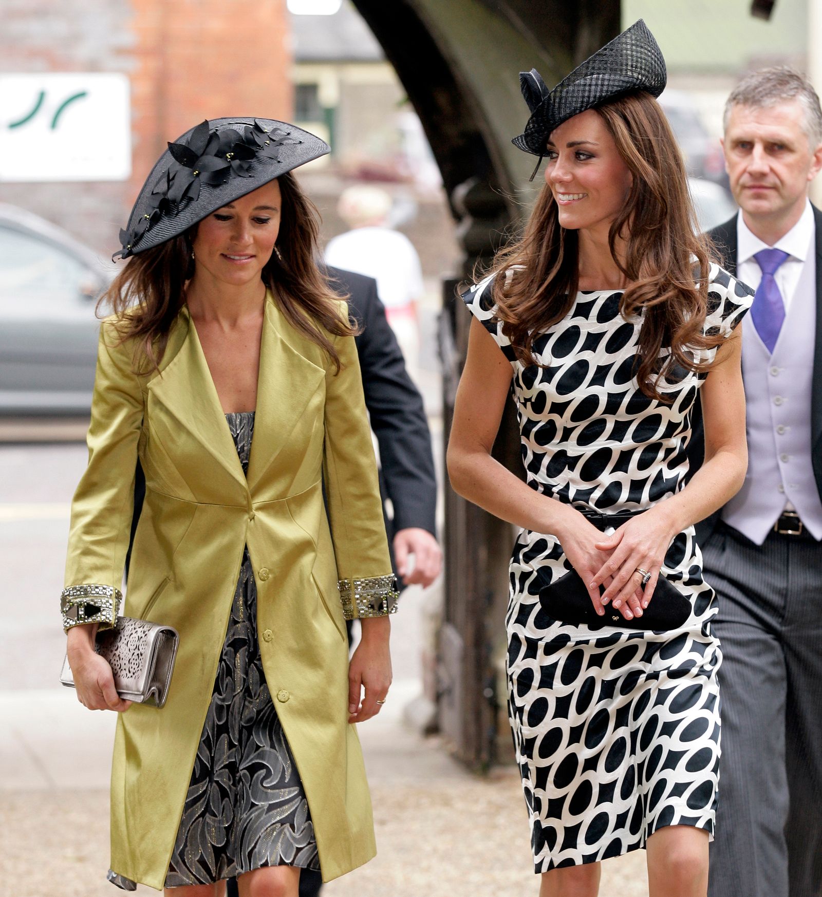 Image may contain Pippa Middleton Person Adult Clothing Coat Hat Accessories Formal Wear Tie Jewelry and Ring