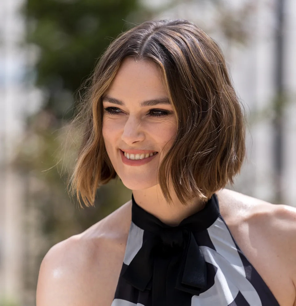 Keira Knightley smiling outdoors