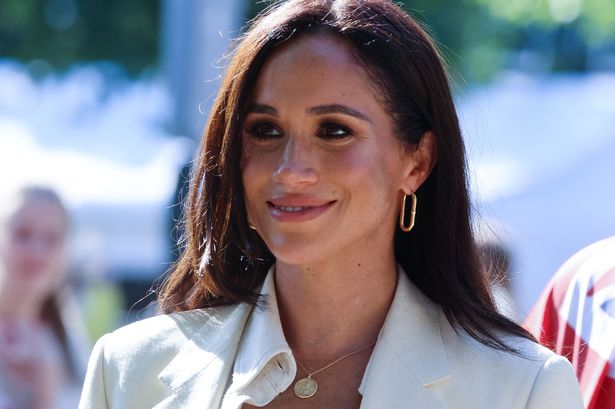 Duke of Sussex Prince Harry (not seen) and his wife Meghan Markle attend the 7th day of Invictus Games in Dusseldorf, 